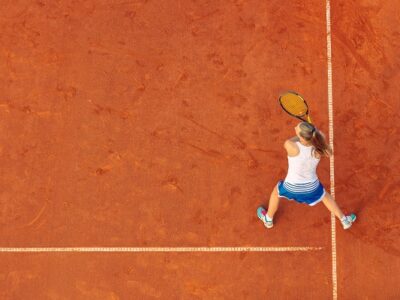 Aerial,Shot,Of,A,Female,Tennis,Player,On,A,Court